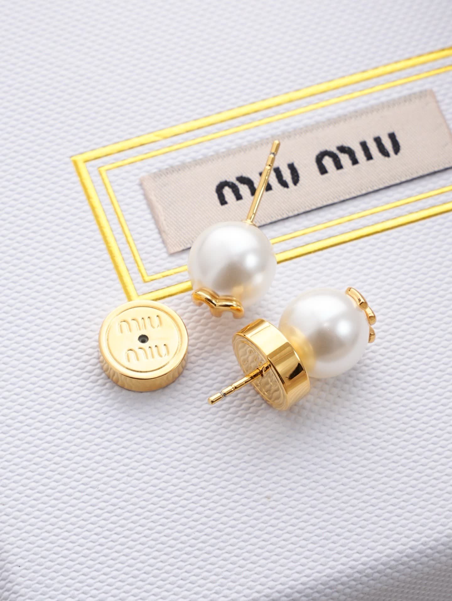 Miu Miu Gold Tone Pearl Stud Earrings